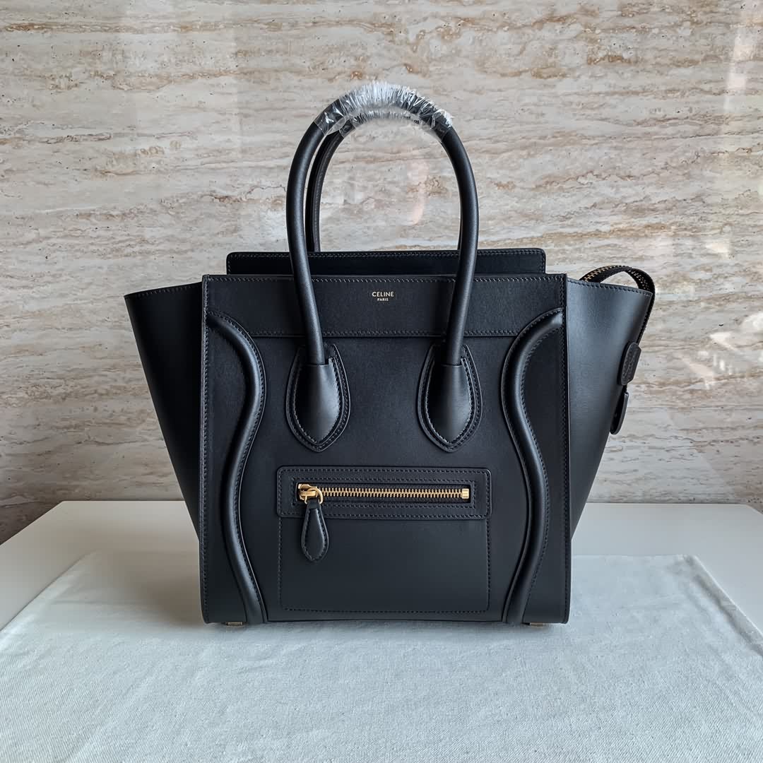 LUGGAGE MICRO超小號轉鼓小牛皮手袋