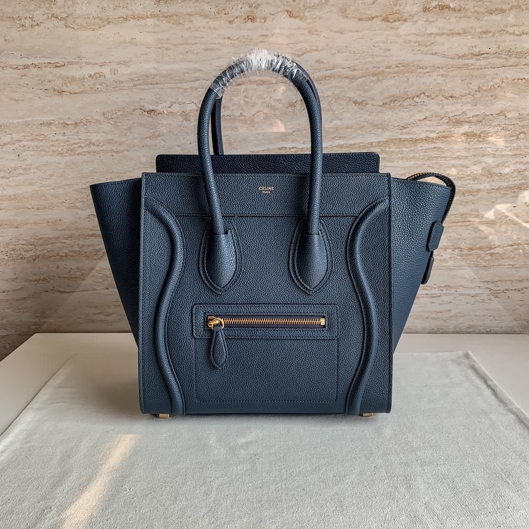 LUGGAGE MICRO超小號轉鼓小牛皮手袋